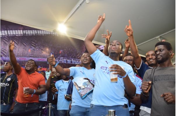 PHOTOS: Fans thrilled as Man City parade trophies in Lagos