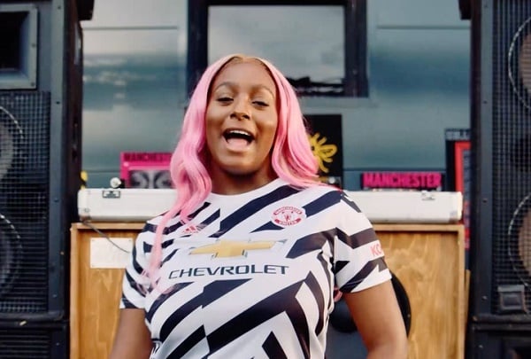 DJ Cuppy features in Man Utd’s new kit unveiling as Burna Boy rocks jersey