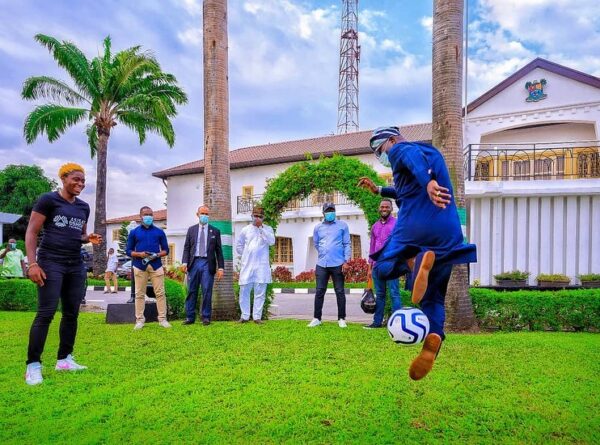 PHOTOS: Sanwo-Olu shows off football skills as Barcelona star visits