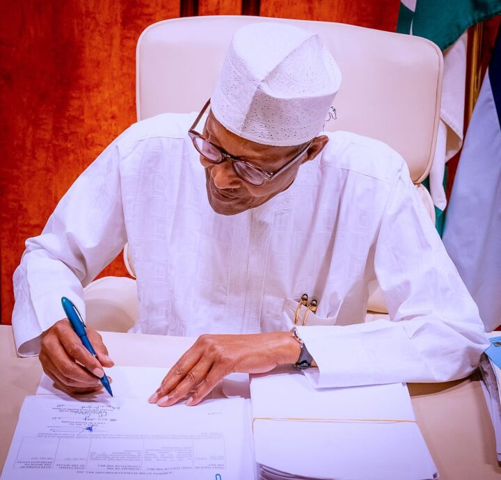 Buhari signs PIA