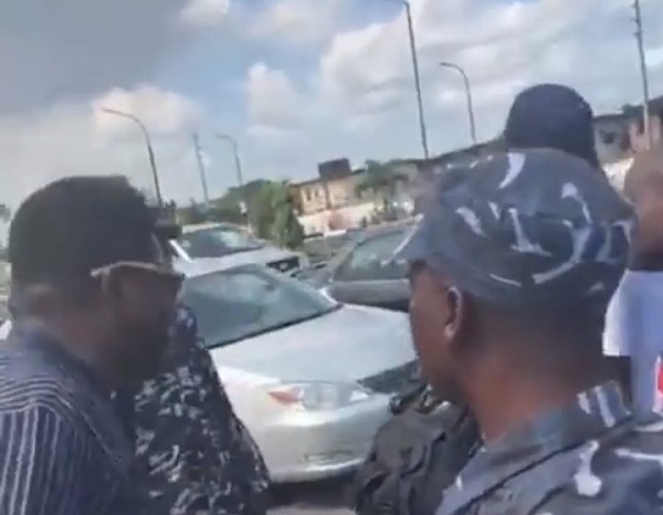 VIDEO: Mr Macaroni confronts police officers accused of extortion