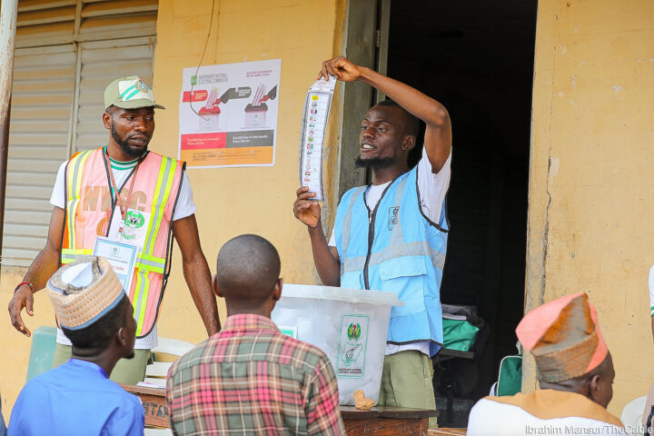 Official collating results during election