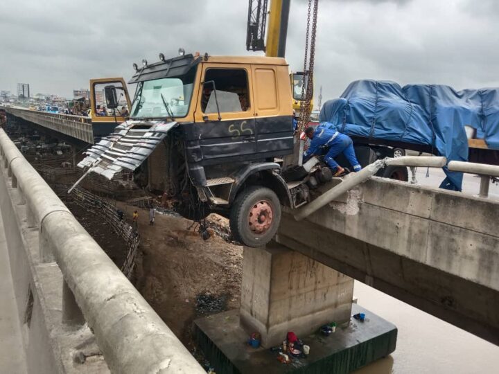 truck dangles from Lagos bridge