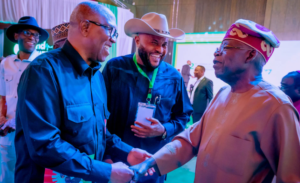 Peter Obi shaking hands with Bola Tinubu