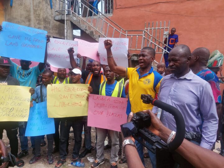 Traders protesting the demolition of their shops at Alaba market