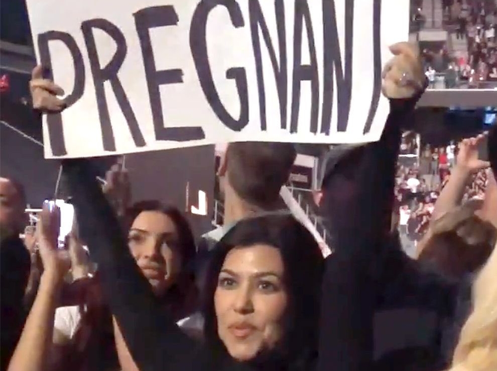 Drama as Kourtney Kardashian announces pregnancy with placard at husband’s concert