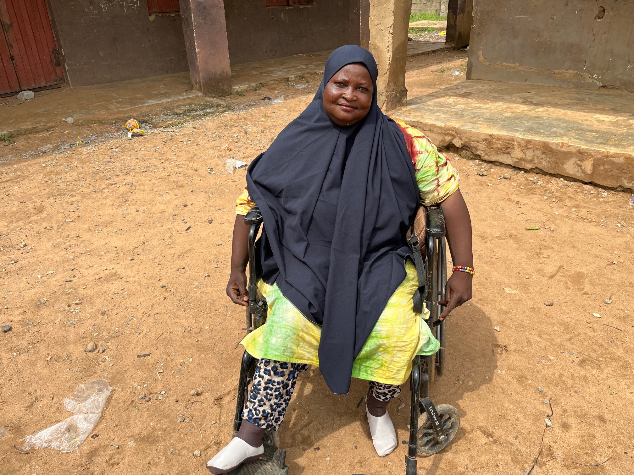 Rabiu Mustapha sits in her wheelchair. Photo credit: Claire Mom/TheCable
