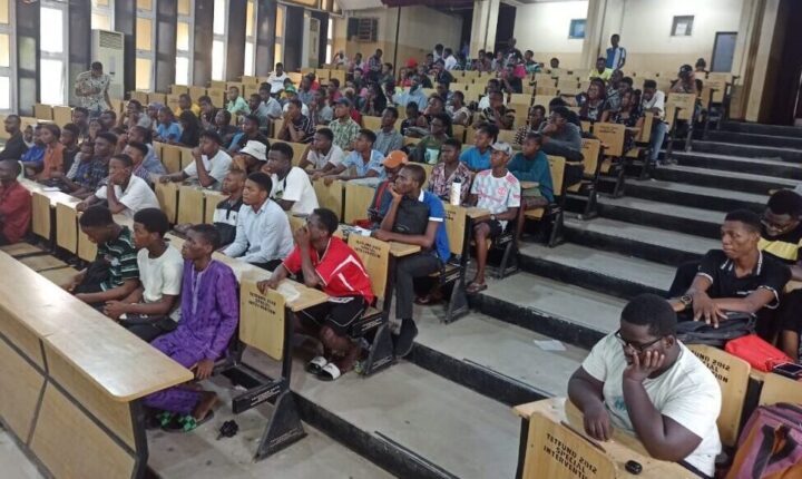 An illusrative photo of Nigerian students in a university lecture hall.