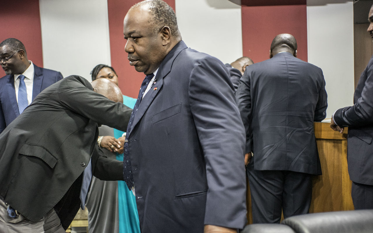 Ali Bongo is fitted with a microphone while in power (Credit: Guardian Nigeria)