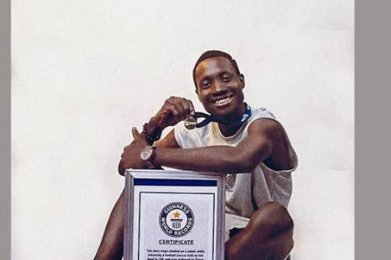 Nigerian man sets world record for ladder-climbing with ball on head