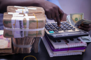 Naira gains at official window, depreciates at parallel market