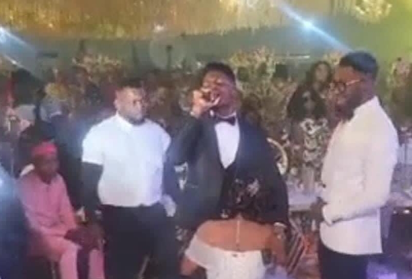 Reactions as actress Ekene Umenwa kneels before Moses Bliss on her wedding day