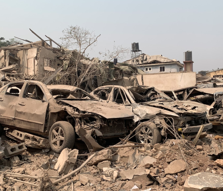 photo of several cars and buildings destroyed by Ibadan explosion