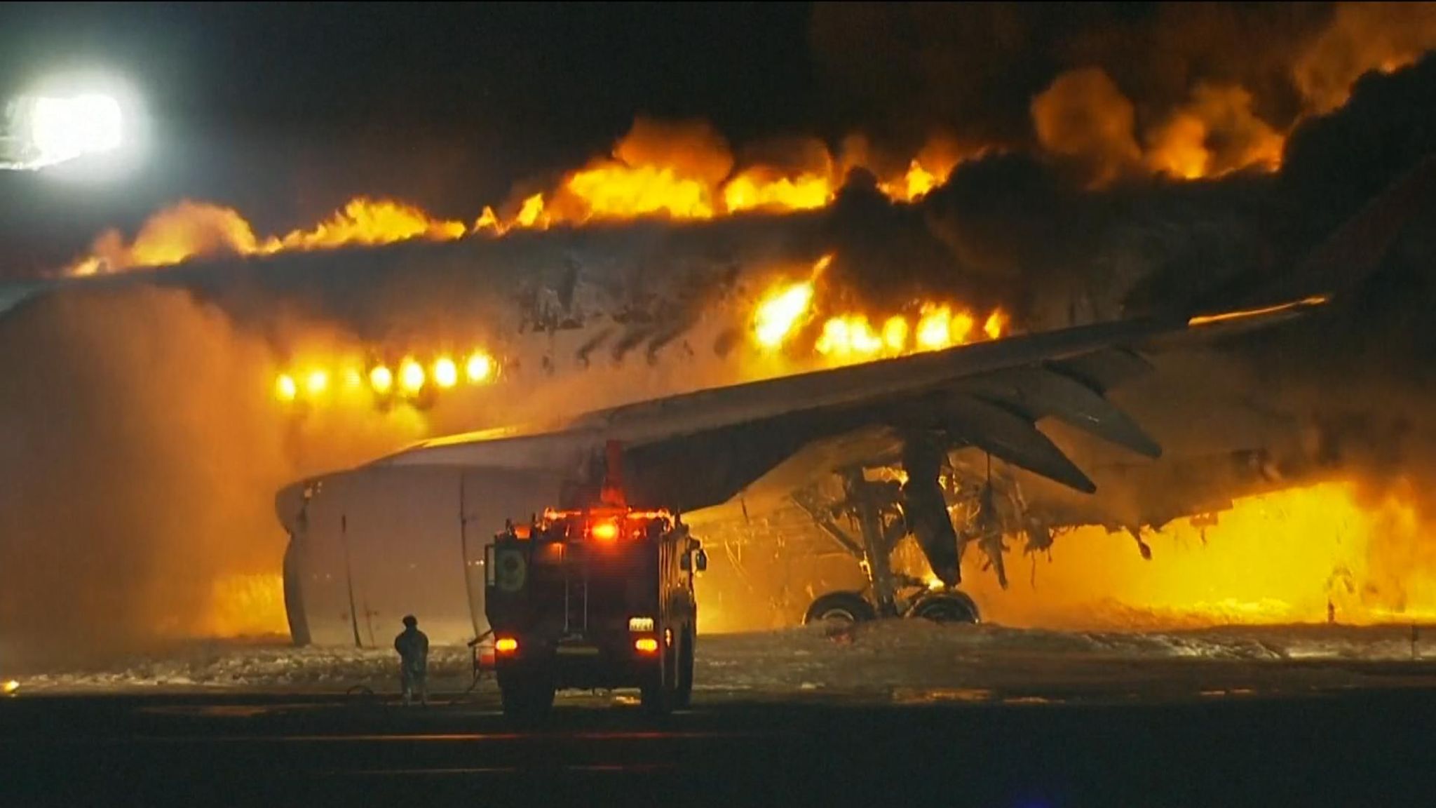 Plane on fire in Japan. Photo credit: Sky news