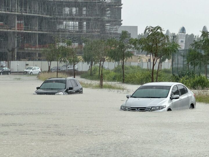 vehicles submerged in water in Dubai