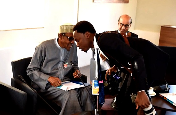 Bayo Omoboriowo details journey from hawking 'pure water' to becoming Buhari's photographer