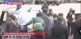 EXTRA: Tinubu slips while boarding presidential parade vehicle on Democracy Day