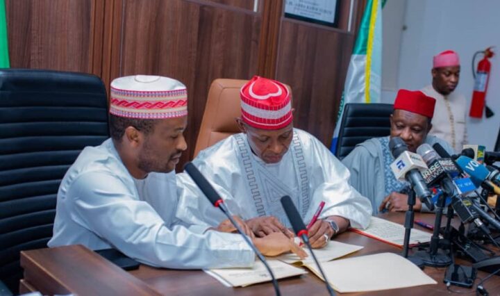 Abba Yusuf, governor of Kano signs bill creating three second-class emirates in the state.