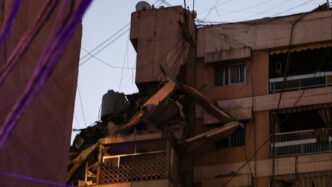 Beirut building hit by Israel. Photo credit: Paramount Plus