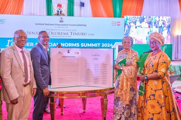 Oluremi Tinubu flanked by UNFPA officials in Abuja