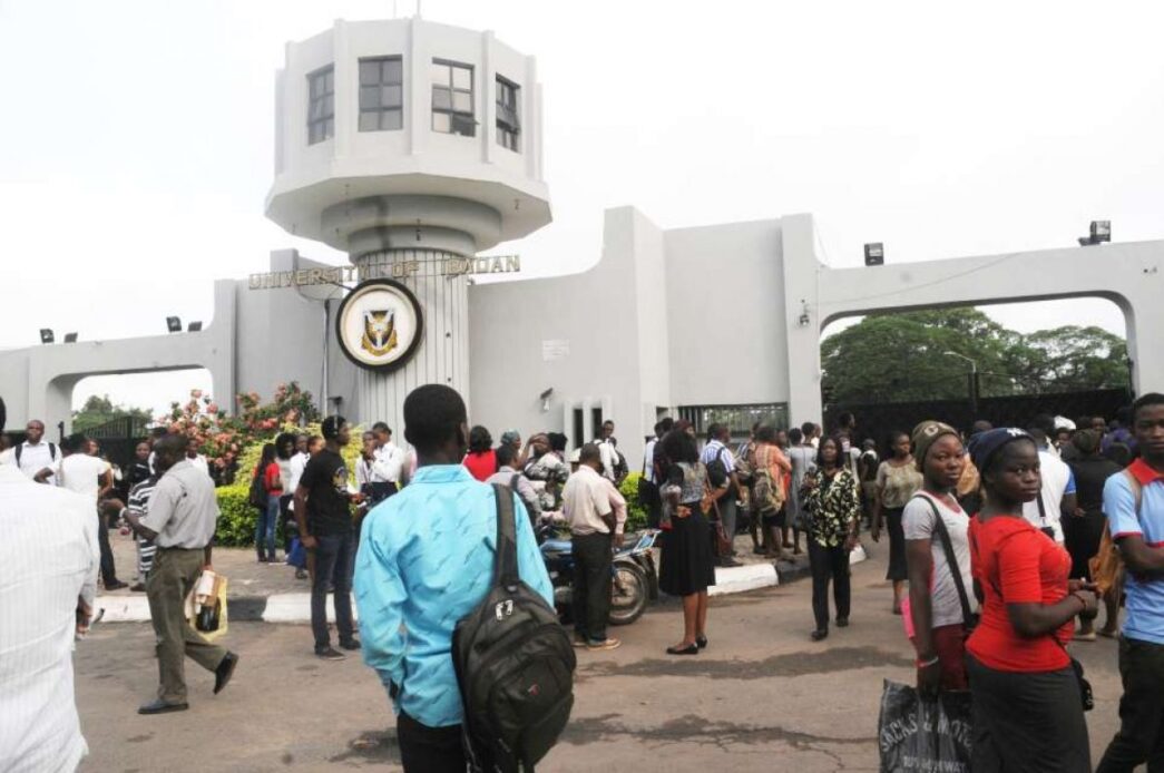 A photo of students thronging the University of Ibadan (UI) main gate.