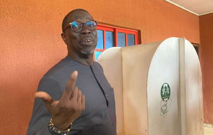 Asue Ighodalo, candidate of PDP, casts his vote