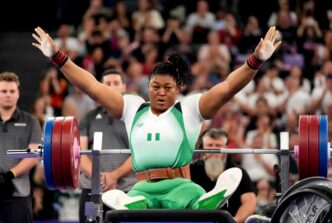 Nigeria's Folashade Oluwafemiayo celebrates her record-breaking feat in the women’s over 86kg Para-Powerlifting category at the Paris Paralympics