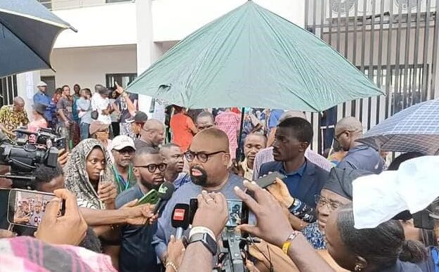 Olumide Akpata, the LP candidate, addressing journalists after casting his vote in Benin City