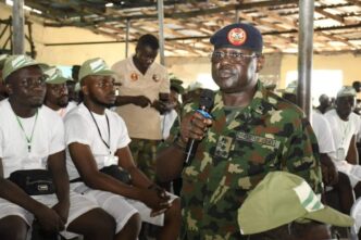 YD Ahmed, director general of the National Youth Service Corps (NYSC) speaking to corps members