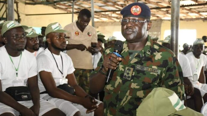 YD Ahmed, director general of the National Youth Service Corps (NYSC) speaking to corps members