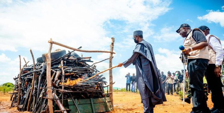 Nuhu Ribadu, national security adviser, setting fire on seized illegal arms