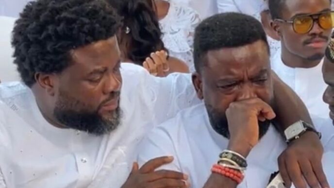 Kunle Afolayan ends feud with brother Aremu at mum's funeral