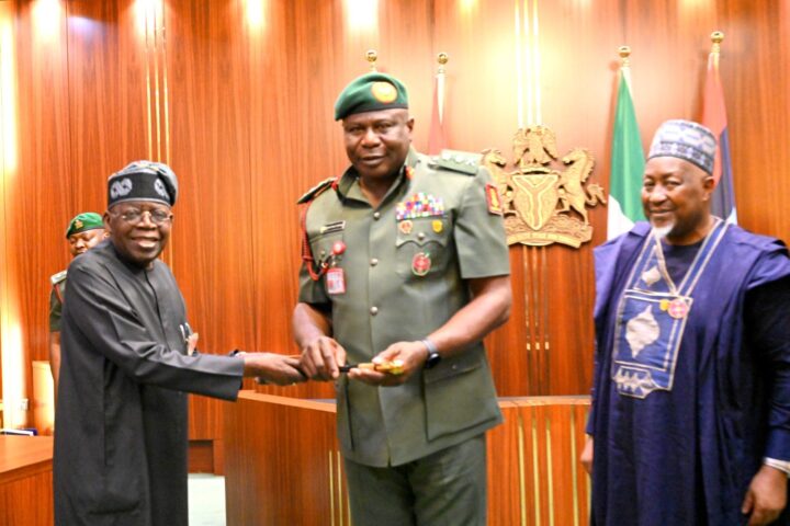 President Bola Tinubu and Olufemi Oluyede