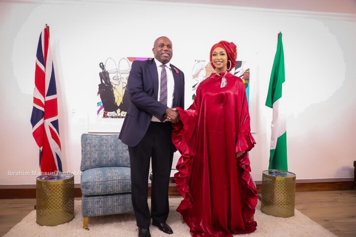 David Lammy, UK foreign secretary in a hand shake with Hannatu Musawa, Nigeria’s minister of art, culture and creative economy