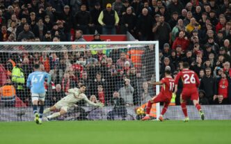 Mohammed Salah scores penalty for Liverpool in their EPL clash with Manchester City at Anfield