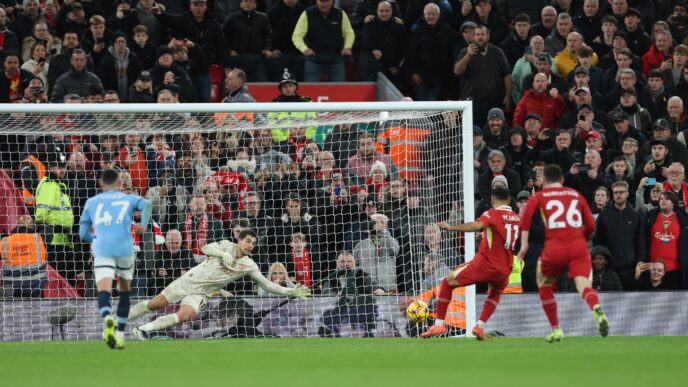 Mohammed Salah scores penalty for Liverpool in their EPL clash with Manchester City at Anfield