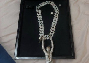 Burna Boy gifts Seun Kuti custom diamond chain of Fela