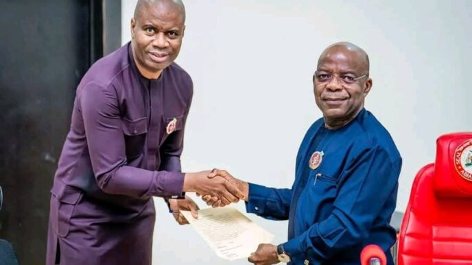 Benson Ojeikere (left) and Alex Otti, governor of Abia state