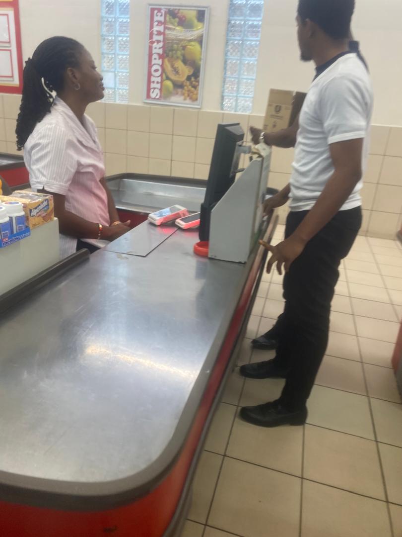 Shoprite attendants attending to customers