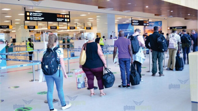 travelers at an airport in Ghana