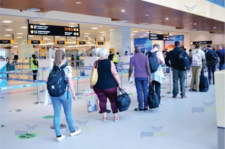 travelers at an airport in Ghana