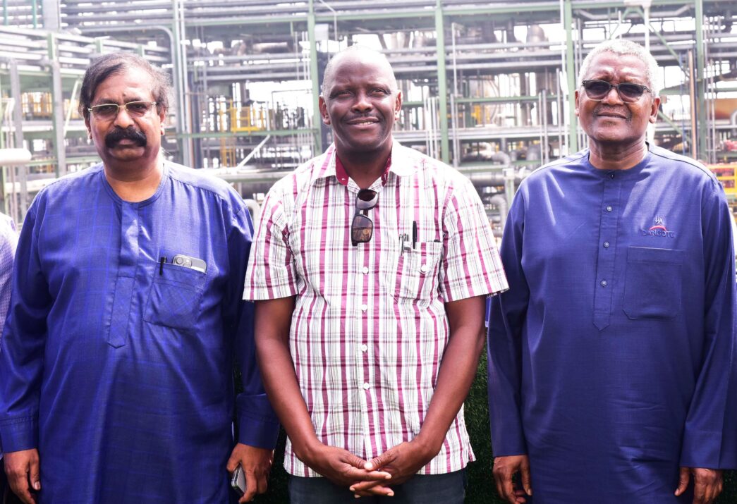 Edwin Devakumar, the vice-president of Dangote Industries Limited, Makozo Chikote, Zambia's energy minister, and Aliko Dangote, chairman of Dangote Industries Limited (DIL) during a tour of the Dangote Petroleum Refinery by Zambian government officials on February 2, 2025