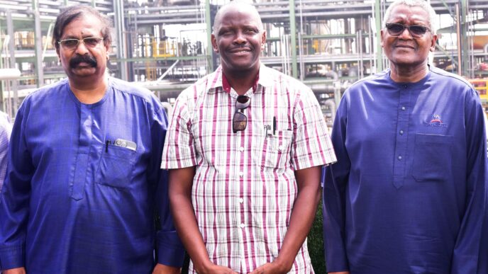 Edwin Devakumar, the vice-president of Dangote Industries Limited, Makozo Chikote, Zambia's energy minister, and Aliko Dangote, chairman of Dangote Industries Limited (DIL) during a tour of the Dangote Petroleum Refinery by Zambian government officials on February 2, 2025