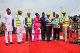 A photo from the flagging-off ceremony of the Benin-Asaba road project